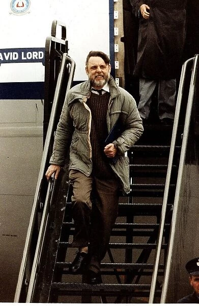 Terry Waite former Beirut hostage arrives home descending aircraft steps November 1991