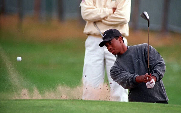 Tiger Woods practises for Open Golf Championship July 1997 playing his way out of a