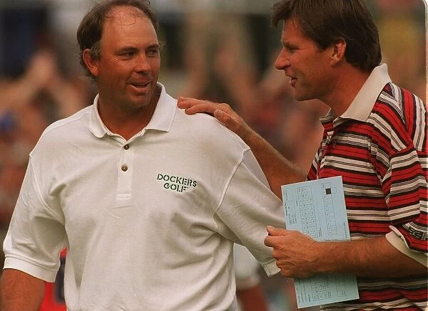 Tom Lehman is congratulated by Nick Faldo after he wins the British Open golf tournament