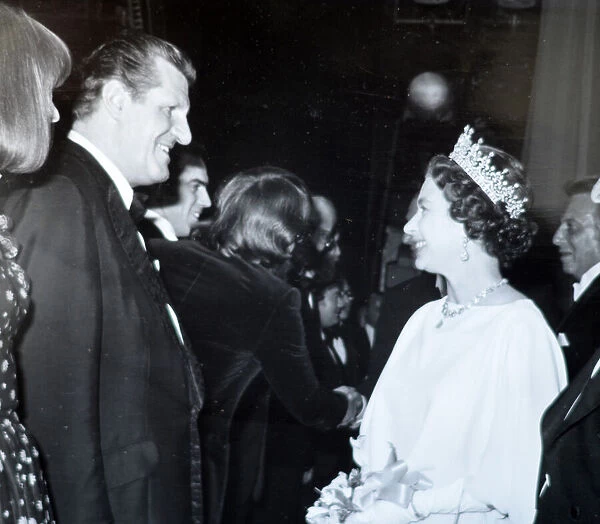 Tommy Cooper with Queen Elizabeth Queens Silver Jubilee a Royal Gala Performance
