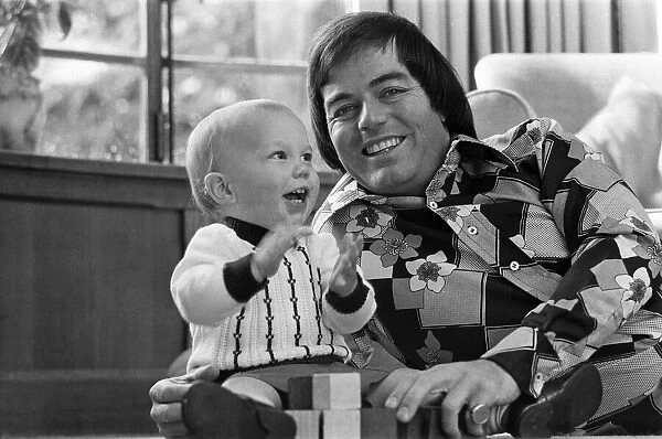 Tony Blackburn at home in Cookham Dean, Berkshire, with his son Simon. 5th September 1974