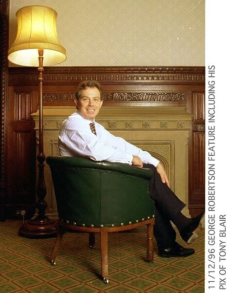 Tony Blair MP sitting in green chair under lamp picture taken by George Robertson. 1996