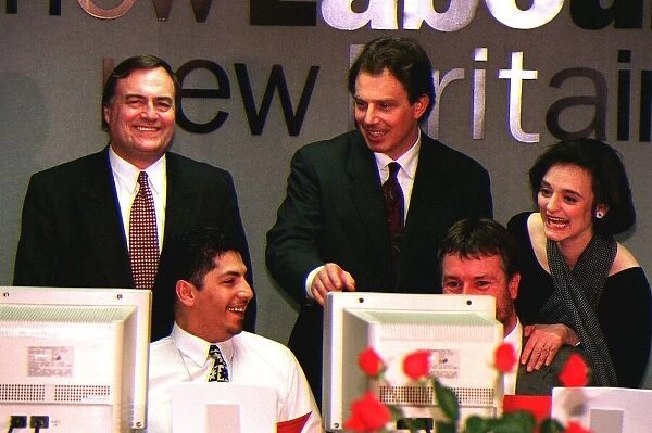 Tony Blair with wife Cherie and Deputy Leader John Prescott showing their delight