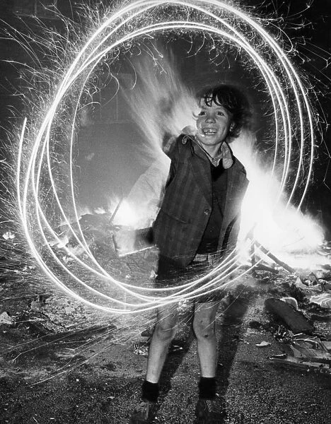 The traditional sparkler still holds plenty of magic for eight year old Terry Gibaney of