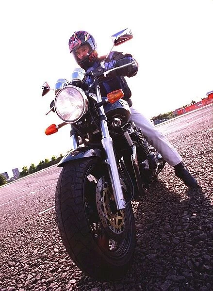 Trevor Walls sitting on a Yamaha XJR 1200 motorbike October 1998