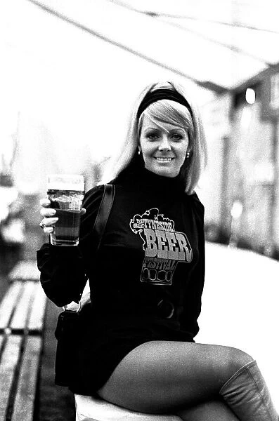 The Tyneside Beer Festival at Gosforth 22 April 1973 - A young girl enjoying pint