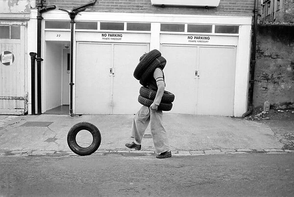Unusual  /  Man  /  Tyres  /  Humour  /  Comedy. All Tyred up Brighton Tyre Fitter