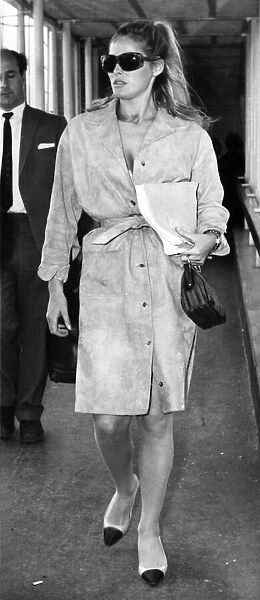 Ursulas Flying Fashion: Actress Ursula Andress is pictured here leaving London