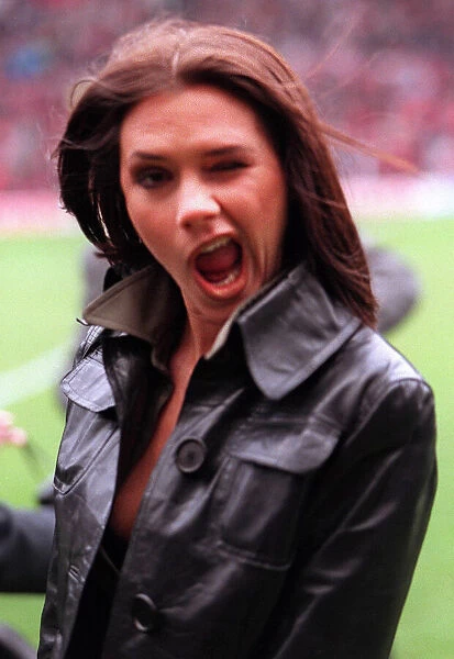 Victoria Adams member of pop group the Spice Girls suddenly likes football as she visits