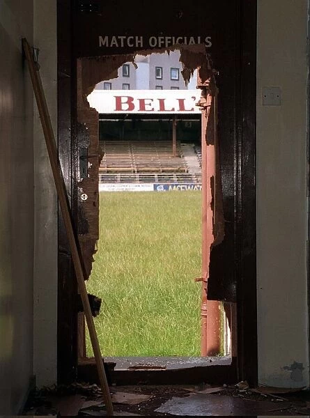 A view through a battered doorway of the stand at Kilbowie Park