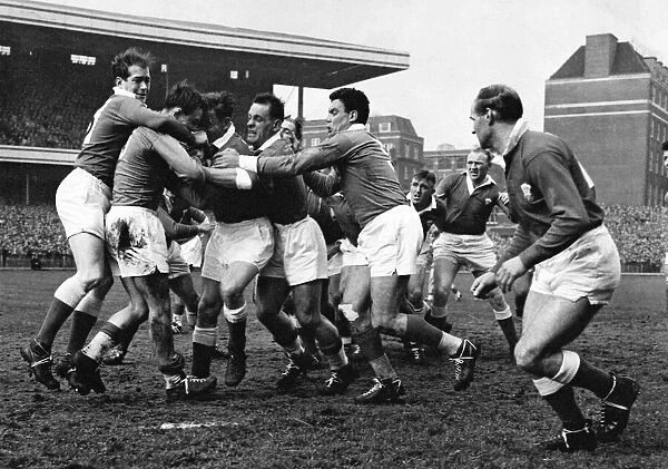 Vigier, as the two teams clash in Cardiff in 1958. Full-back Terry Davies kicked a 50