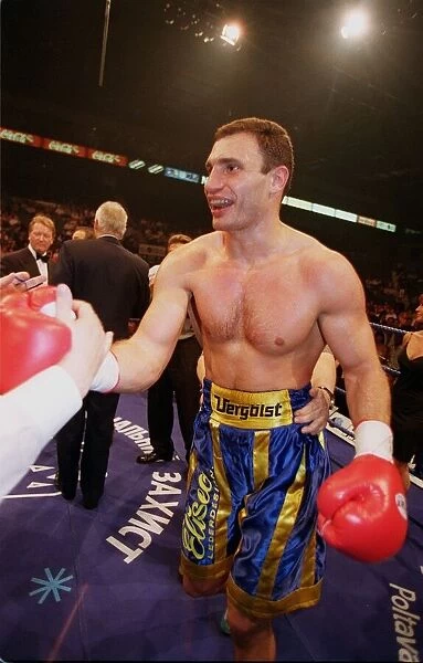Vitali klitschko smiling after knocking out britians Herbie Hide in two rounds to take