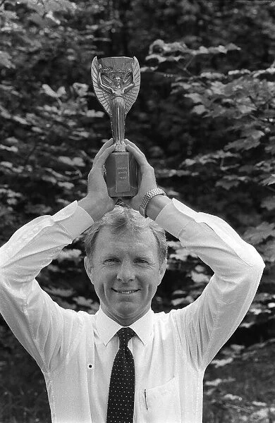 West Ham and England Footballer Bobby Moore with the the old Jules Rimet World Cup
