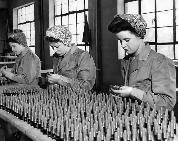 Women - Industry 1940 s. Girls at a Lanchester County Durham factory helping to pack