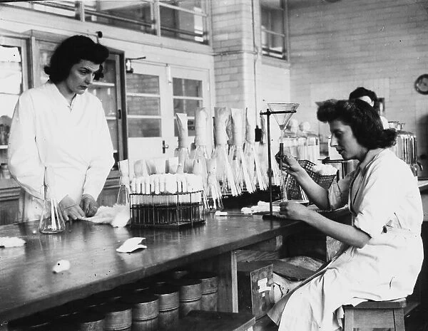 Women working in a laboratory owned by Distillers Co Ltd at Speke, Liverpool, was