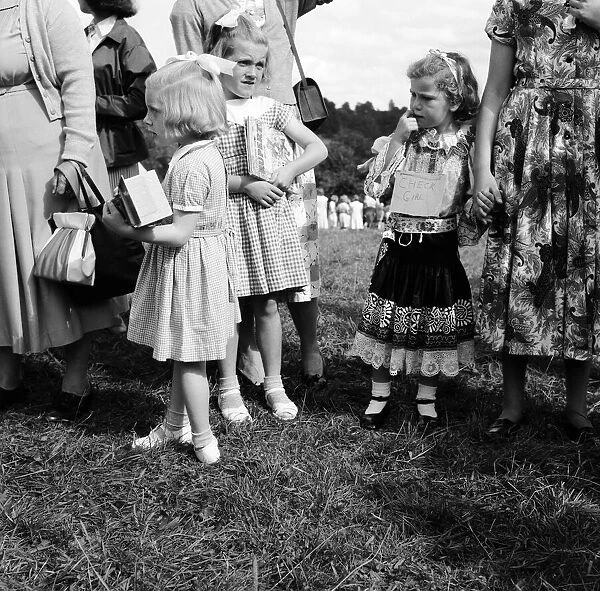 Women and young girls at the Village Fete in Horsley, Gloucestershire. 30th August 1954