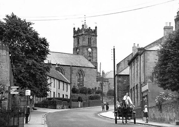 Woolers parish church, in 1939, stands on Castle Hill