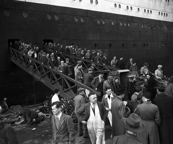 Workmen leaving the Cunard Liner The Queen Elizabeth, 30th January 1953