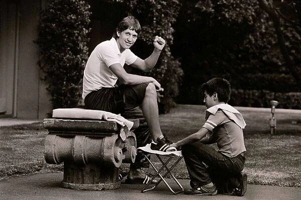 World Cup 1986 in Mexico. England striker Gary Lineker gets his boots polished by a