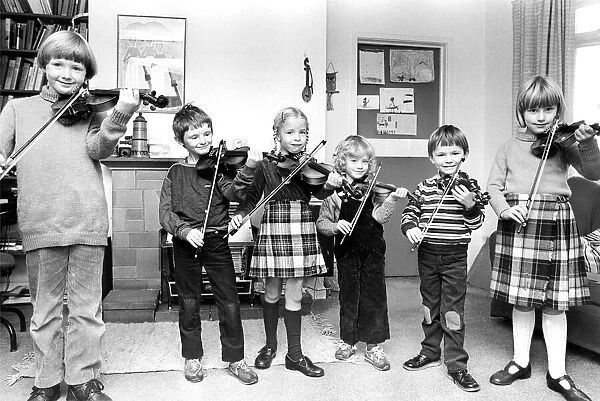 Young violinists getting in some practice in October 1982