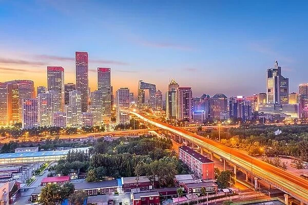 Beijing, China modern financial district cityscape at dusk