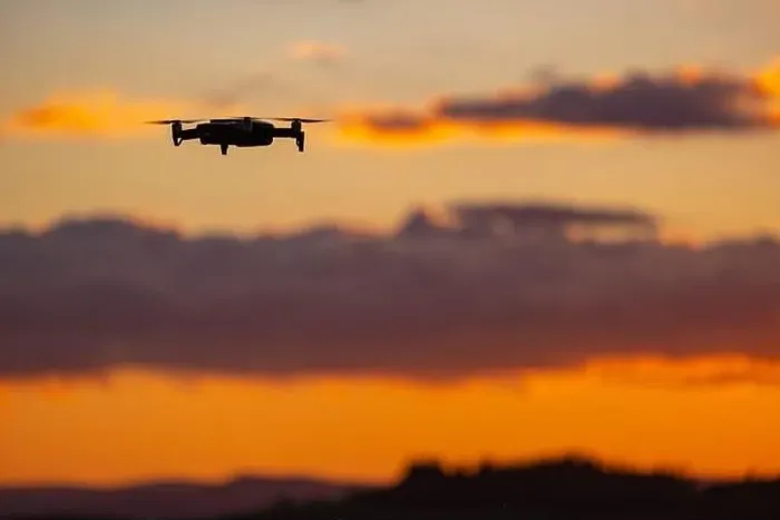 Framed Print : Drone against Setting Sun Print