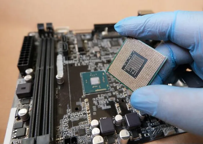 Framed Print : Print of onboard CPU and socketed CPU microprocessors on computer mainboard Framed Print : Print of onboard CPU and socketed CPU microprocessors on computer mainboard