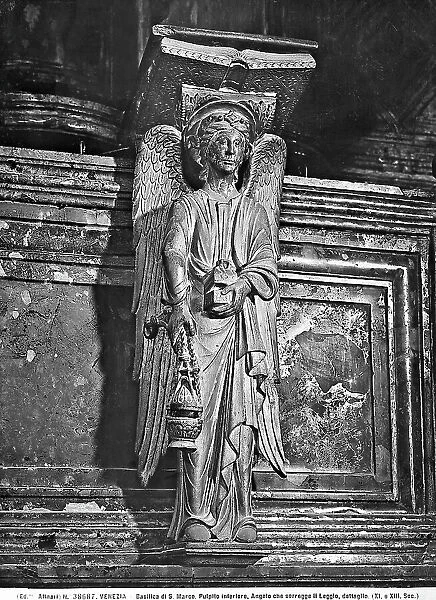 Angel supporting the lectern, pulpit detail, St. Mark's Basilica in Venice