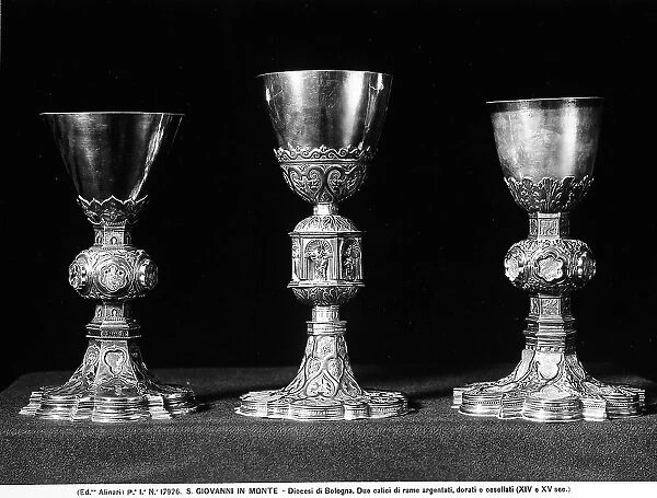 Three chalices in chiseled gilded silver preserved in the Parish Museum of the Church of S. Giovanni in Monte, Bologna