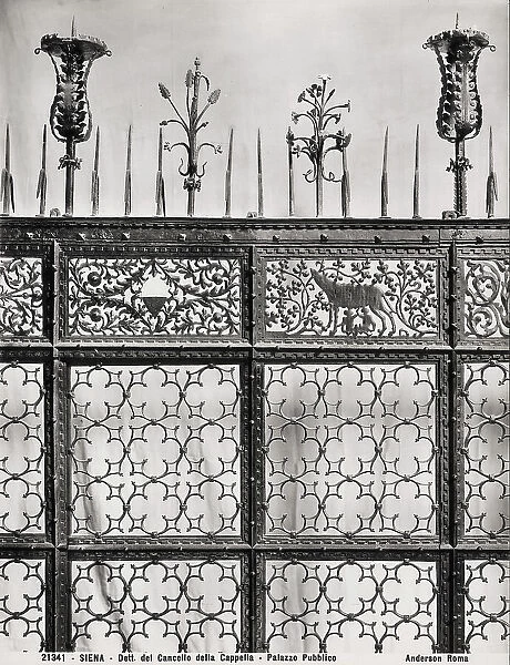 close-up of the wrought iron entrance gate of the chapel in Palazzo Pubblico in Siena, attributable to the Sienese Giacomo and Giovanni di Giovanni