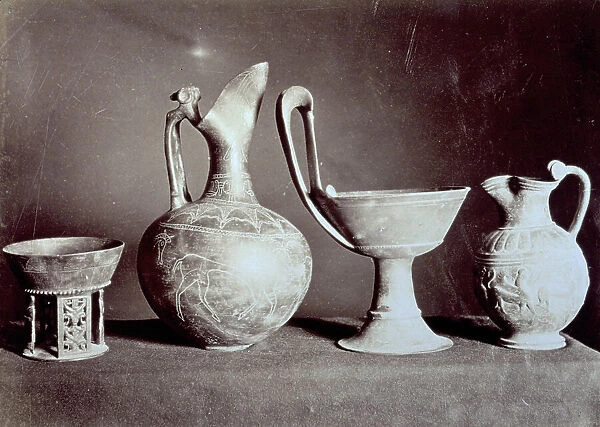 Four corinthian vases dating to the 7th-6th century b.C. in the Etruscan Gregorian Museum in Rome