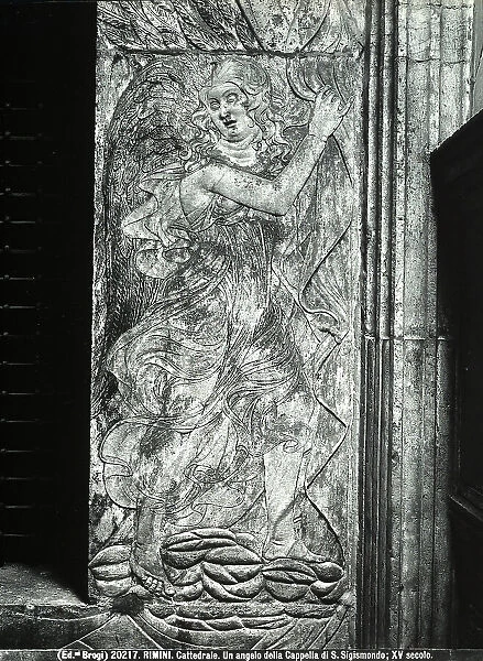 Curtain-holding angel, bas-relief by Agostino di Duccio, collocated in the chapel of St. Sigismondo, in the Malatesta's Temple of Rimini
