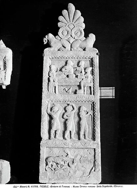 Funerary stele with scenes of a banquet and of a hunt. Etruscan archaeological find preserved in the Archaelogical Museum of Fiesole