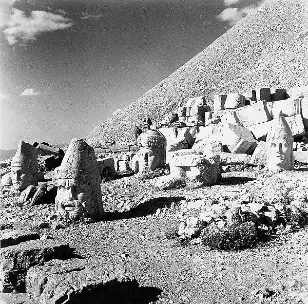 Heads of gods, remains of the colossal statues from the Tomb of Antiochus I, on the summit of Nemrut Dagi