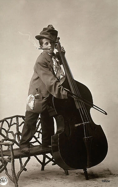 Portrait of a boy with a contrabass