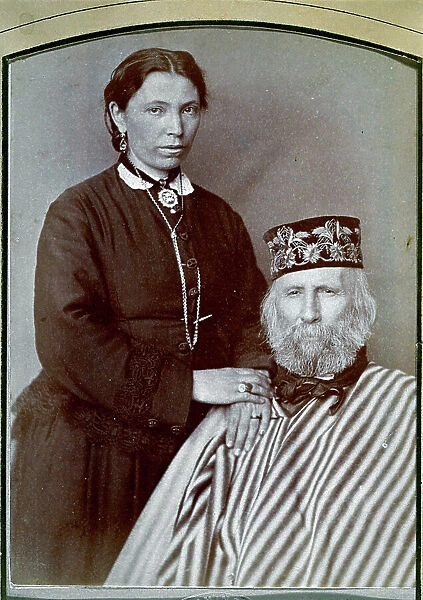 Portrait of Giuseppe Garibaldi and his third wife Francesca Armosino. The famous condottiere is seated. His wife is standing next to him, her hands resting on the right shoulder of her husband