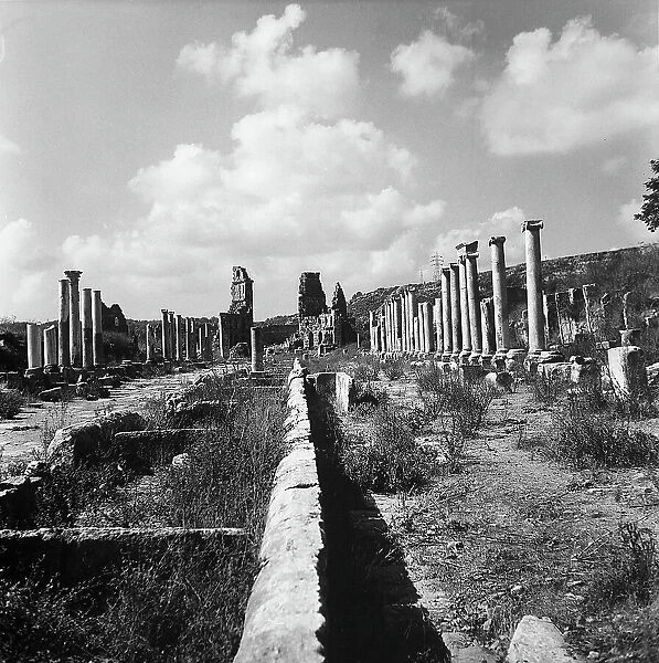 Ruins of the column-lined street from the Hellenistic and Roman period, in the ancient city of Perge, important hub of Pamphilia, on the southern coast of Turkey