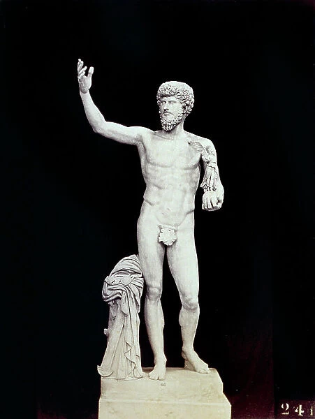 Statue of the young Lucius Verus, in the statue galleryof the Pius-Clementine Museum in Vatican City. The statue dates to the classical period, and shows the emperor Lucius Verus holding a small statue of the winged victory standing on the globe of the earth in his left hand