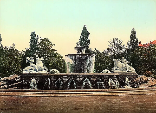 View of a fountain in a park of Munich