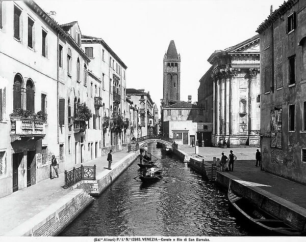 View of the Rio di San Barnaba in Venice; in the background, the bell tower of the church of S. Barnaba and, on the right, Campo San Barnaba with the church of San Barnaba