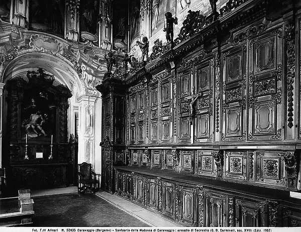 Wardrobe in wood, located in the sacristy of the Sanctuary of the Madonna of Caravaggio, province of Bergamo. Work of G.B. Carminati