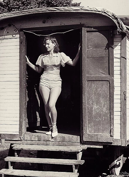 Young woman on a circus carriage