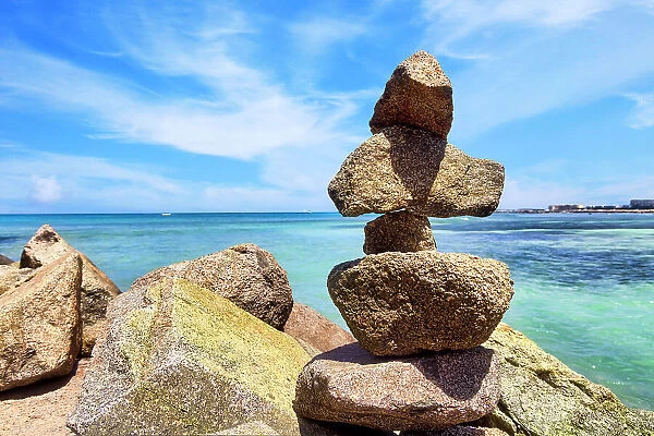 Rocks stacked by water