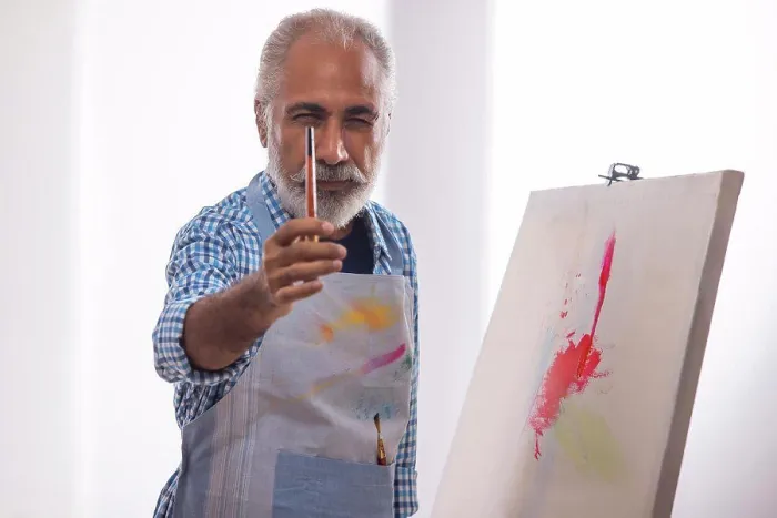 Framed Print : Print of an Old Man Holding a Paintbrush