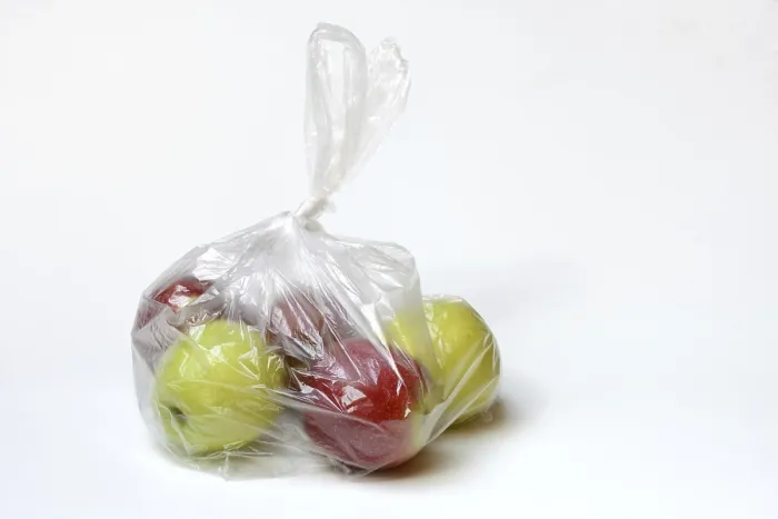Framed Print : Apple in Plastic Bag Print Framed Print : Apple in Plastic Bag Print