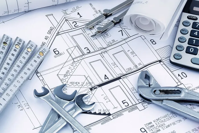 Framed Print : An Architect's Construction Plan with a Calculator Print Framed Print : An Architect's Construction Plan with a Calculator Print