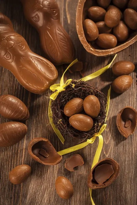 Framed Print : Assorted Chocolate Eggs Print on Wooden Background