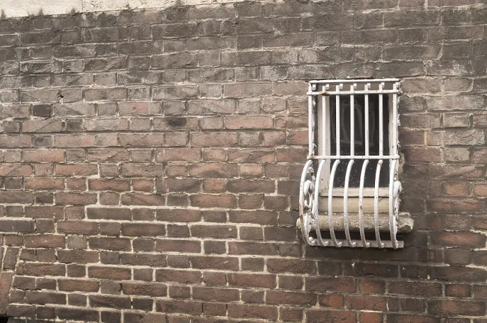 Framed Print : Barred small window on a brick wall Print Framed Print : Barred small window on a brick wall Print