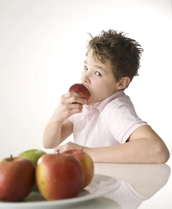 Framed Print : A Boy Biting into a Red Apple Print Framed Print : A Boy Biting into a Red Apple Print