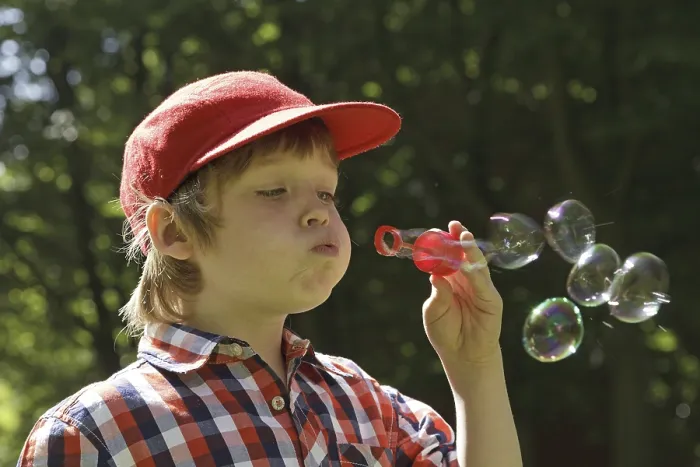 Framed Print : Boy Blowing Soap Bubbles Print Framed Print : Boy Blowing Soap Bubbles Print